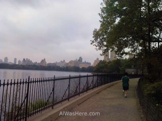 runner-going-along-the-reservoir